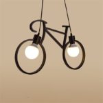 Lampe vélo noir sur fond beige