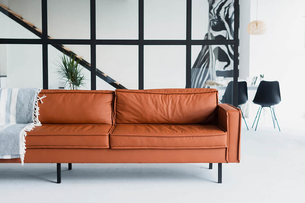 Canapé en cuir orange style industriel