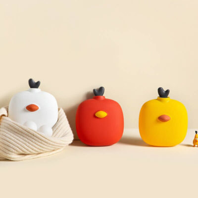 Trois bouillottes peluches en forme de poussin