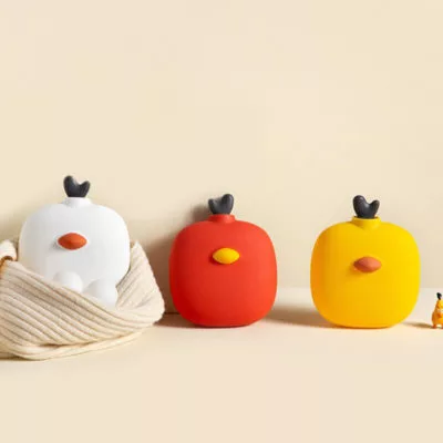 Trois bouillottes peluches en forme de poussin