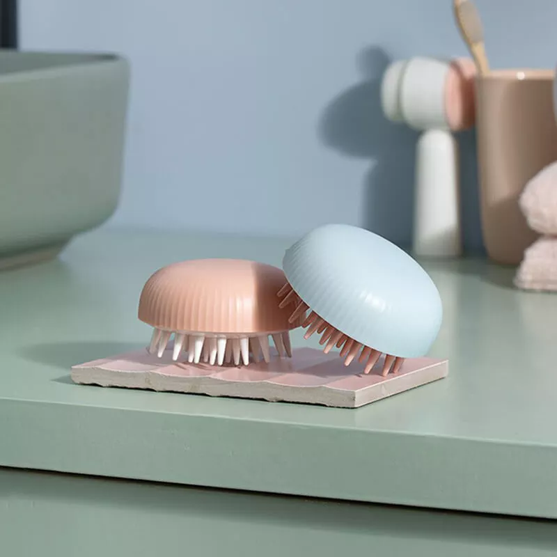 brosse de massage pour la stimulation du cuir chevelu